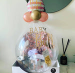 ‘Newborn Essentials’ Bursting balloon + gift package